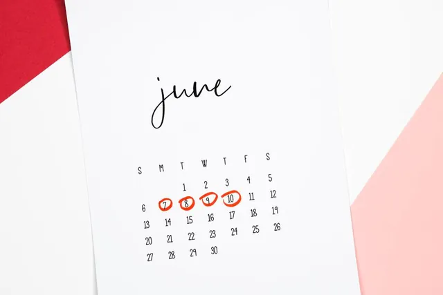A calendar with period dates circled