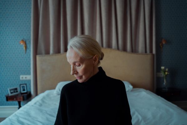 A woman resting, looking low
