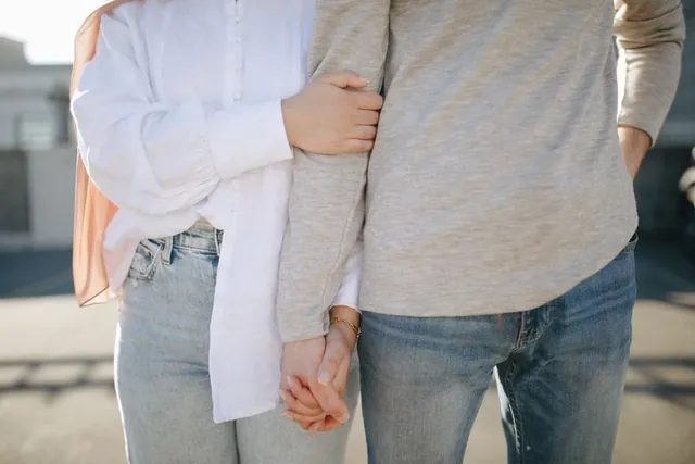 A couple holding hands