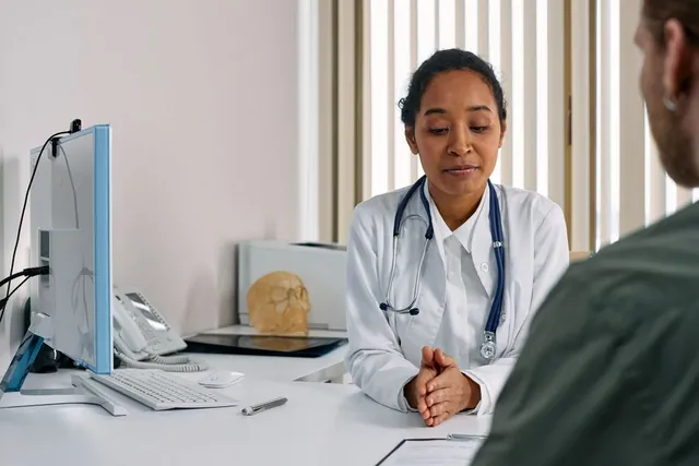 A doctor in consultation with a patient